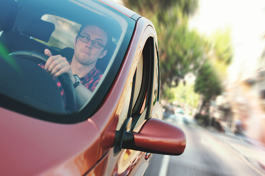 Man driving a car