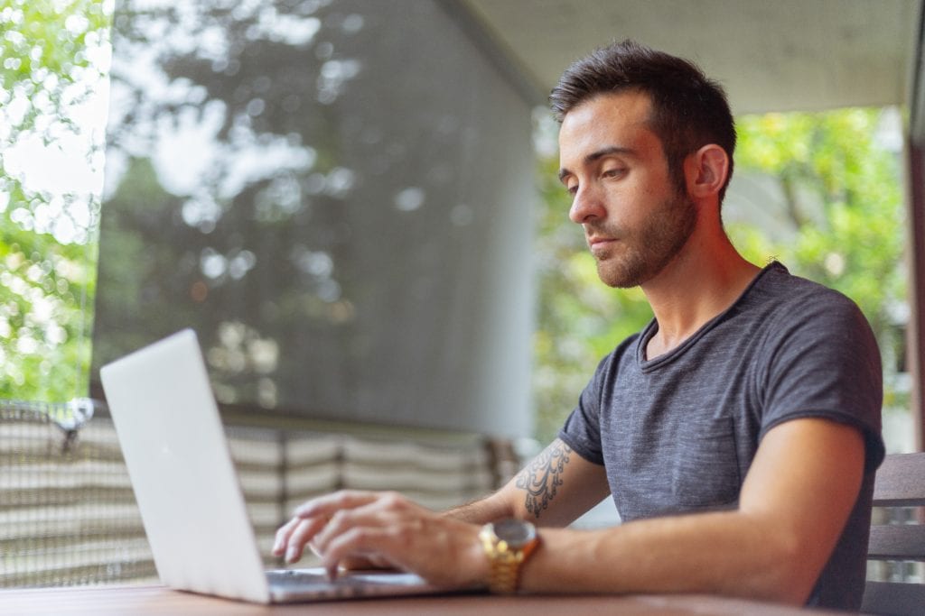 man working on laptop