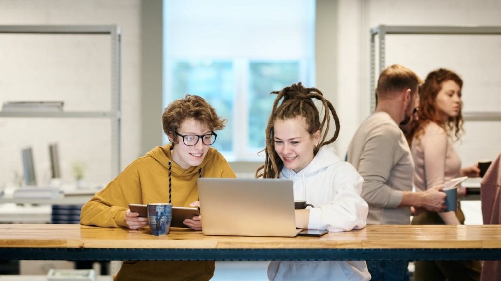 Young people at a coding bootcamp