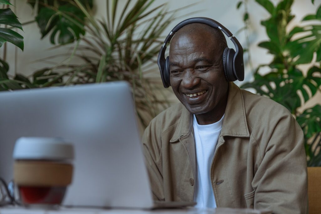 Man attending lecture online