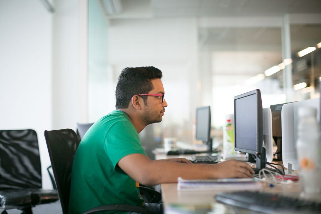 Man looking at computer screen